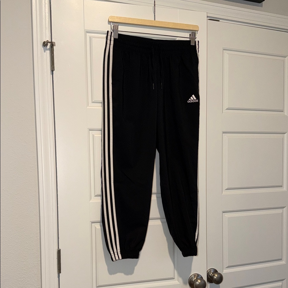 Adidas black 3 stripe joggers with pockets size small